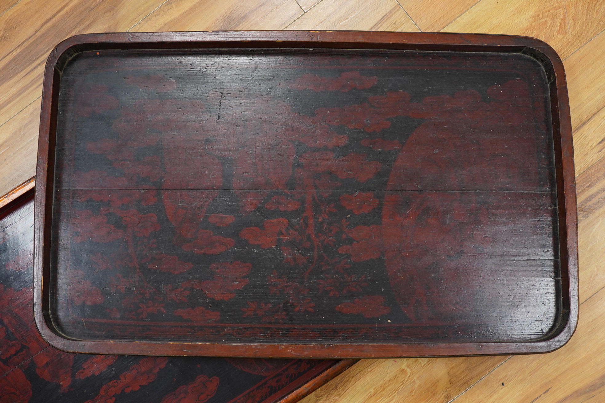 A pair of large Chinese lacquered trays 82 x 52cm